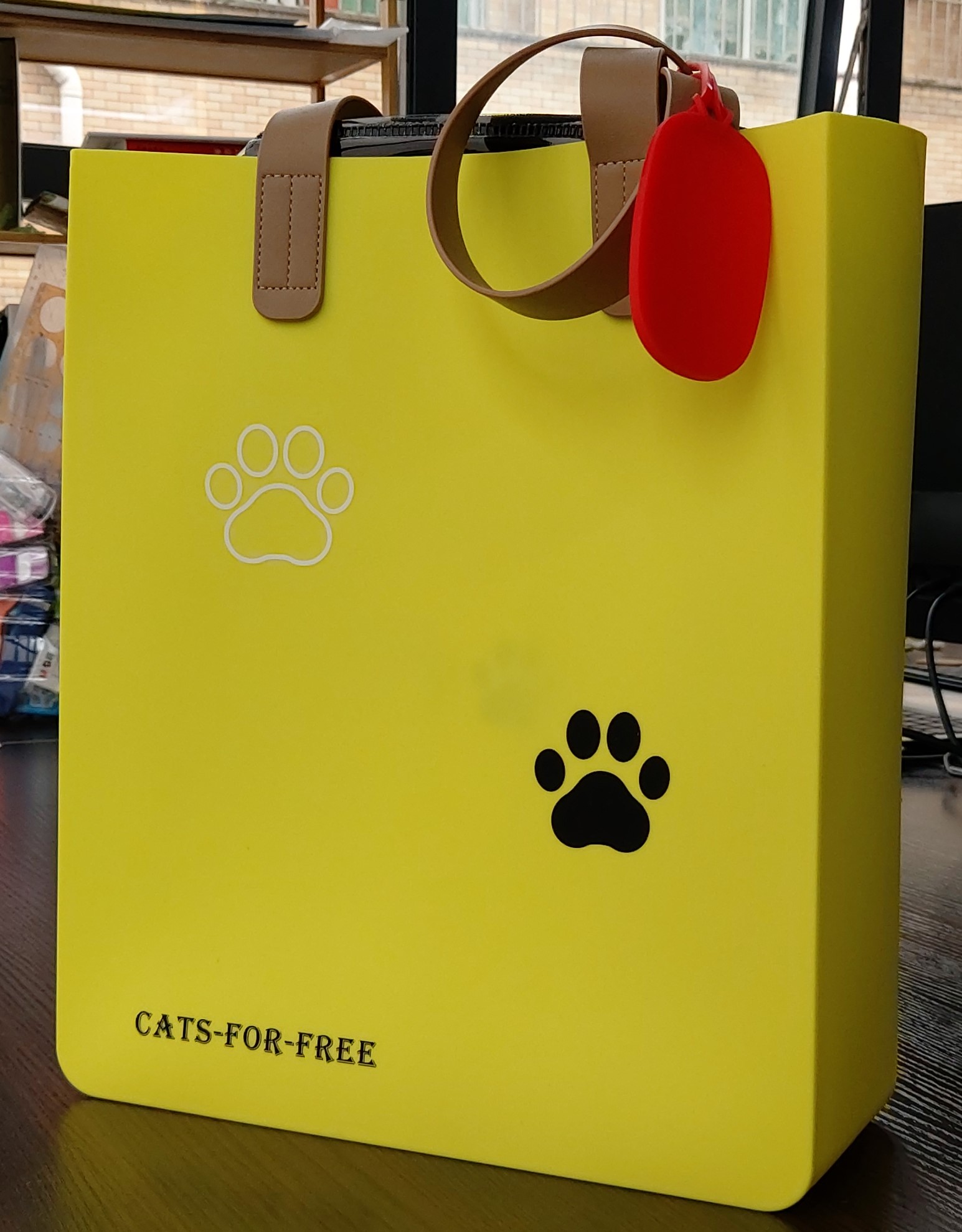 lemon yellow silicone bag with cat paws logo