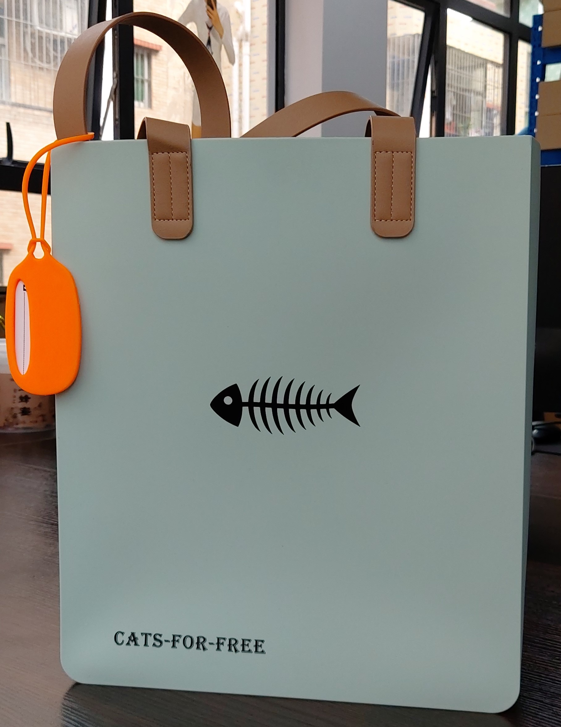 blue silicone bag with fishbone logo